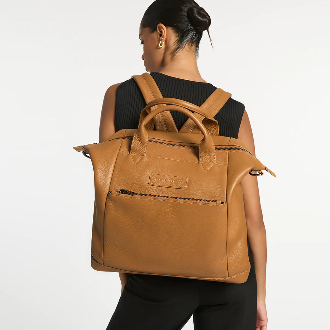 Status anxiety sales backpack